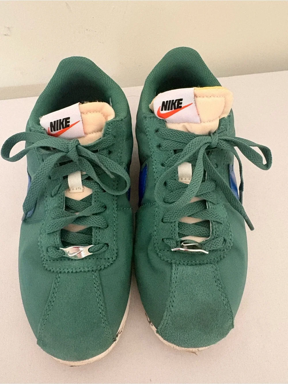 Nike Green Suede Sneakers with Blue Swoosh and Cream Tongue